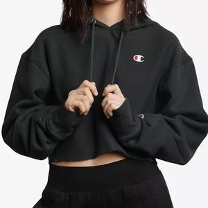 Champion black cropped hoodie in size S